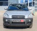 Серый Хендай Туксон, объемом двигателя 2.7 л и пробегом 210 тыс. км за 8990 $, фото 1 на Automoto.ua