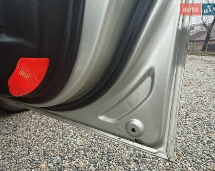 Сірий Хендай Туксон, об'ємом двигуна 1.98 л та пробігом 169 тис. км за 7890 $, фото 22 на Automoto.ua