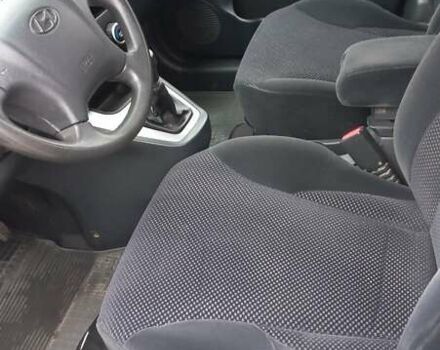 Сірий Хендай Туксон, об'ємом двигуна 2 л та пробігом 203 тис. км за 7700 $, фото 13 на Automoto.ua