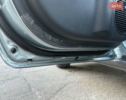 Серый Хендай Туксон, объемом двигателя 2 л и пробегом 110 тыс. км за 10200 $, фото 39 на Automoto.ua
