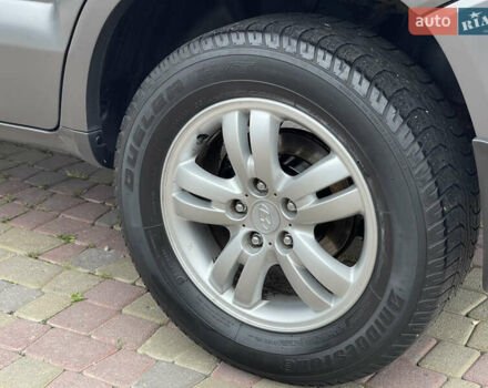 Серый Хендай Туксон, объемом двигателя 2 л и пробегом 182 тыс. км за 7600 $, фото 18 на Automoto.ua