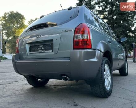 Серый Хендай Туксон, объемом двигателя 2 л и пробегом 110 тыс. км за 10200 $, фото 8 на Automoto.ua