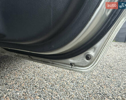 Сірий Хендай Туксон, об'ємом двигуна 1.98 л та пробігом 169 тис. км за 7890 $, фото 23 на Automoto.ua