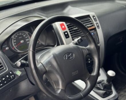 Серый Хендай Туксон, объемом двигателя 2 л и пробегом 159 тыс. км за 7299 $, фото 13 на Automoto.ua