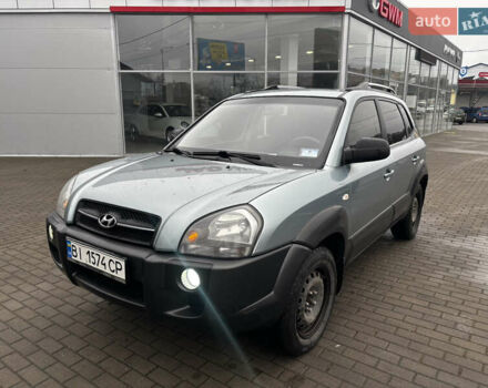 Сірий Хендай Туксон, об'ємом двигуна 2 л та пробігом 255 тис. км за 7600 $, фото 1 на Automoto.ua