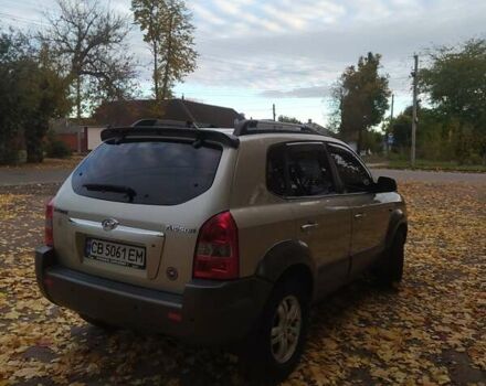 Серый Хендай Туксон, объемом двигателя 1.98 л и пробегом 250 тыс. км за 7300 $, фото 2 на Automoto.ua