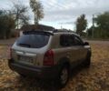 Серый Хендай Туксон, объемом двигателя 1.98 л и пробегом 250 тыс. км за 7300 $, фото 2 на Automoto.ua