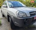 Серый Хендай Туксон, объемом двигателя 1.98 л и пробегом 193 тыс. км за 7700 $, фото 4 на Automoto.ua