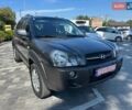 Сірий Хендай Туксон, об'ємом двигуна 1.98 л та пробігом 169 тис. км за 7900 $, фото 1 на Automoto.ua