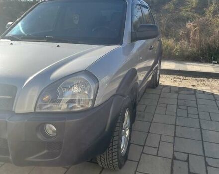 Серый Хендай Туксон, объемом двигателя 2 л и пробегом 161 тыс. км за 7000 $, фото 1 на Automoto.ua