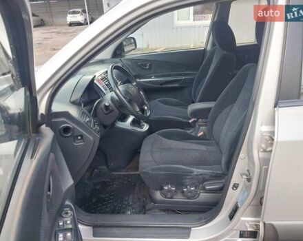 Серый Хендай Туксон, объемом двигателя 2 л и пробегом 168 тыс. км за 7000 $, фото 14 на Automoto.ua