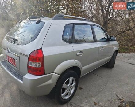 Серый Хендай Туксон, объемом двигателя 1.98 л и пробегом 173 тыс. км за 7450 $, фото 23 на Automoto.ua