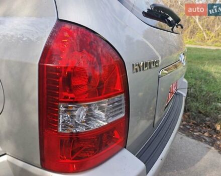 Серый Хендай Туксон, объемом двигателя 1.98 л и пробегом 173 тыс. км за 7450 $, фото 19 на Automoto.ua