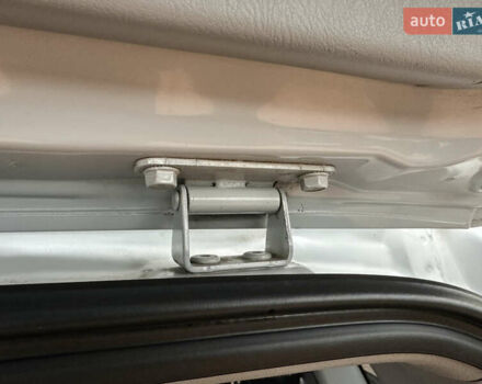 Серый Хендай Туксон, объемом двигателя 1.98 л и пробегом 217 тыс. км за 8500 $, фото 37 на Automoto.ua