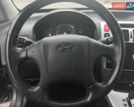 Сірий Хендай Туксон, об'ємом двигуна 2 л та пробігом 190 тис. км за 8600 $, фото 62 на Automoto.ua