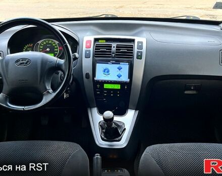 Сірий Хендай Туксон, об'ємом двигуна 2 л та пробігом 281 тис. км за 7200 $, фото 9 на Automoto.ua