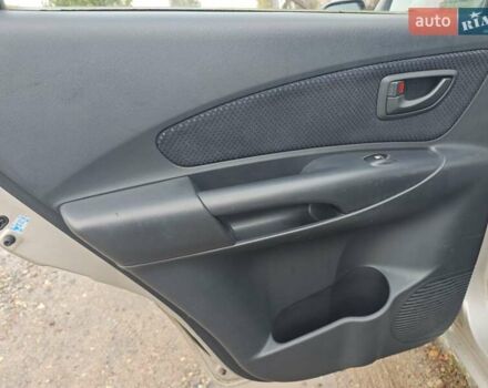 Серый Хендай Туксон, объемом двигателя 1.98 л и пробегом 173 тыс. км за 7450 $, фото 7 на Automoto.ua