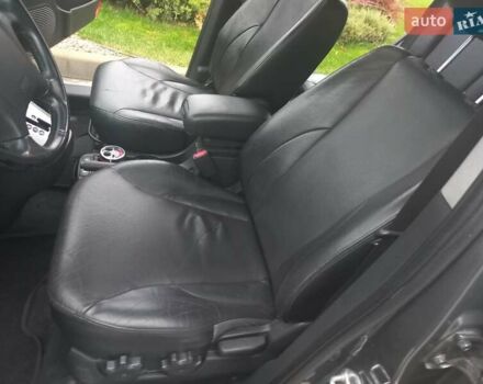 Сірий Хендай Туксон, об'ємом двигуна 2 л та пробігом 190 тис. км за 8600 $, фото 57 на Automoto.ua