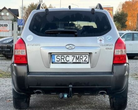 Серый Хендай Туксон, объемом двигателя 2 л и пробегом 262 тыс. км за 3750 $, фото 4 на Automoto.ua