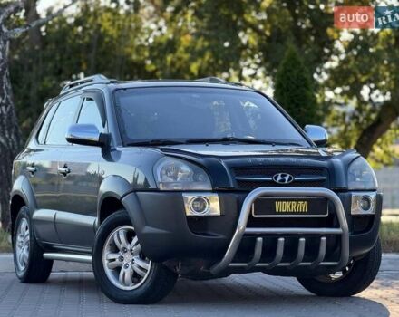 Серый Хендай Туксон, объемом двигателя 1.98 л и пробегом 282 тыс. км за 8350 $, фото 7 на Automoto.ua