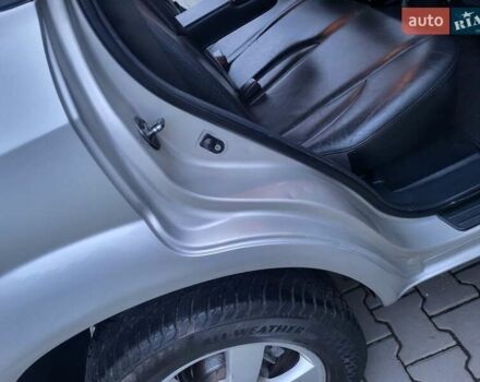 Серый Хендай Туксон, объемом двигателя 2 л и пробегом 240 тыс. км за 8300 $, фото 130 на Automoto.ua
