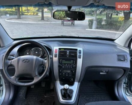 Серый Хендай Туксон, объемом двигателя 2 л и пробегом 110 тыс. км за 10200 $, фото 10 на Automoto.ua