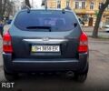 Серый Хендай Туксон, объемом двигателя 2 л и пробегом 290 тыс. км за 7500 $, фото 4 на Automoto.ua
