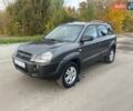 Серый Хендай Туксон, объемом двигателя 1.98 л и пробегом 233 тыс. км за 7700 $, фото 8 на Automoto.ua