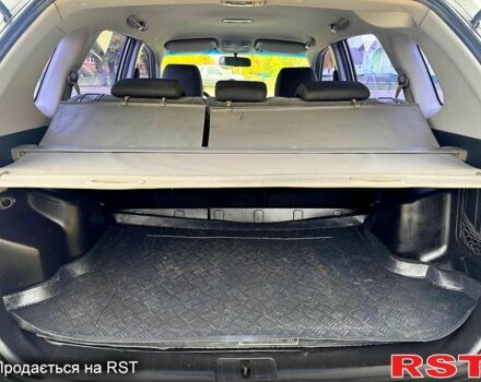 Сірий Хендай Туксон, об'ємом двигуна 2 л та пробігом 316 тис. км за 6780 $, фото 7 на Automoto.ua