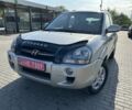 Серый Хендай Туксон, объемом двигателя 2 л и пробегом 241 тыс. км за 7700 $, фото 1 на Automoto.ua