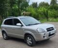 Серый Хендай Туксон, объемом двигателя 1.99 л и пробегом 225 тыс. км за 8300 $, фото 3 на Automoto.ua