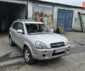 Серый Хендай Туксон, объемом двигателя 2 л и пробегом 330 тыс. км за 4000 $, фото 1 на Automoto.ua