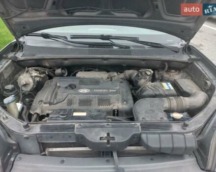 Сірий Хендай Туксон, об'ємом двигуна 2 л та пробігом 190 тис. км за 8600 $, фото 15 на Automoto.ua