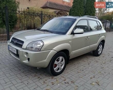 Сірий Хендай Туксон, об'ємом двигуна 1.98 л та пробігом 225 тис. км за 6999 $, фото 1 на Automoto.ua