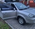 Серый Хендай Туксон, объемом двигателя 2 л и пробегом 240 тыс. км за 8300 $, фото 67 на Automoto.ua