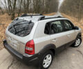 Серый Хендай Туксон, объемом двигателя 1.98 л и пробегом 269 тыс. км за 7100 $, фото 4 на Automoto.ua