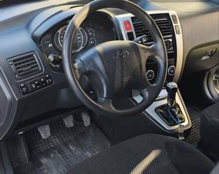 Серый Хендай Туксон, объемом двигателя 1.98 л и пробегом 193 тыс. км за 8400 $, фото 23 на Automoto.ua