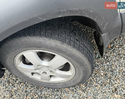 Сірий Хендай Туксон, об'ємом двигуна 1.98 л та пробігом 169 тис. км за 7890 $, фото 26 на Automoto.ua