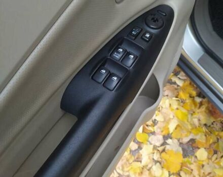 Серый Хендай Туксон, объемом двигателя 1.98 л и пробегом 250 тыс. км за 7300 $, фото 8 на Automoto.ua