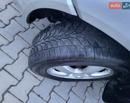 Серый Хендай Туксон, объемом двигателя 2 л и пробегом 240 тыс. км за 8300 $, фото 154 на Automoto.ua