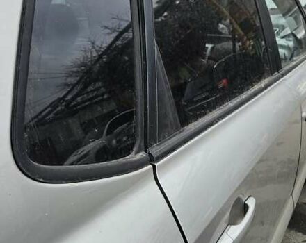 Серый Хендай Туксон, объемом двигателя 2 л и пробегом 330 тыс. км за 4000 $, фото 13 на Automoto.ua