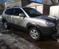 Серый Хендай Туксон, объемом двигателя 2 л и пробегом 151 тыс. км за 9400 $, фото 1 на Automoto.ua