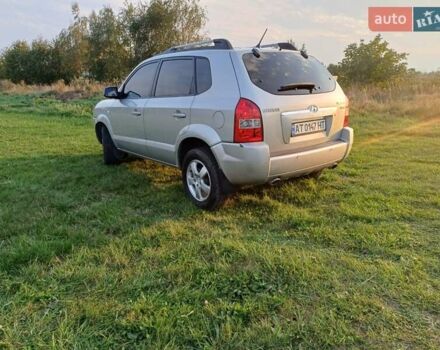 Серый Хендай Туксон, объемом двигателя 1.99 л и пробегом 239 тыс. км за 7800 $, фото 12 на Automoto.ua
