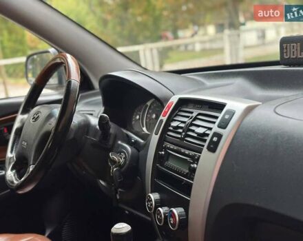 Серый Хендай Туксон, объемом двигателя 2 л и пробегом 271 тыс. км за 7400 $, фото 30 на Automoto.ua