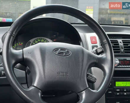 Серый Хендай Туксон, объемом двигателя 2 л и пробегом 182 тыс. км за 7600 $, фото 21 на Automoto.ua