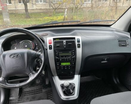 Серый Хендай Туксон, объемом двигателя 2 л и пробегом 290 тыс. км за 6400 $, фото 9 на Automoto.ua