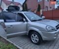 Серый Хендай Туксон, объемом двигателя 2 л и пробегом 240 тыс. км за 8300 $, фото 64 на Automoto.ua