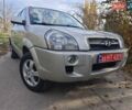 Серый Хендай Туксон, объемом двигателя 1.98 л и пробегом 173 тыс. км за 7450 $, фото 1 на Automoto.ua