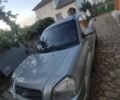 Сірий Хендай Туксон, об'ємом двигуна 2 л та пробігом 214 тис. км за 6899 $, фото 1 на Automoto.ua