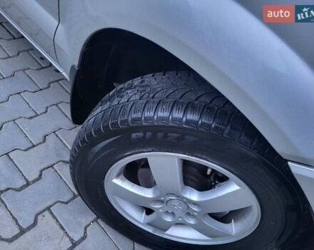 Серый Хендай Туксон, объемом двигателя 2 л и пробегом 240 тыс. км за 8300 $, фото 155 на Automoto.ua